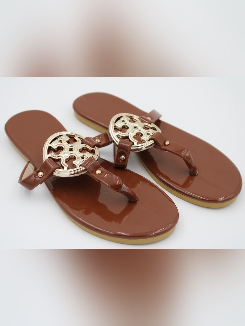 Brown Patent T-Strap Thong Sandals with Gold Medallion – 6.5